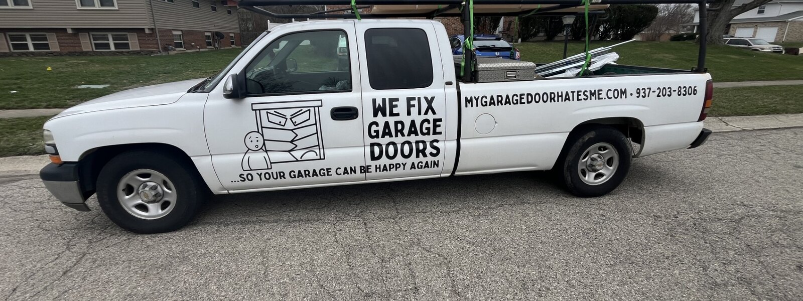 We Fix Garage Doors truck — so your garage can be happy again, mygaragedoorhatesme.com, (937) 203-8306